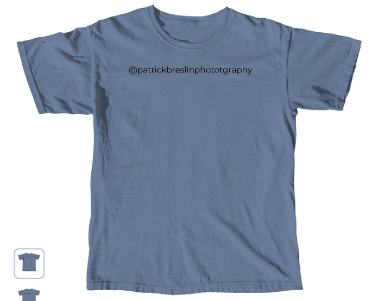 Blue tee shirt with writing